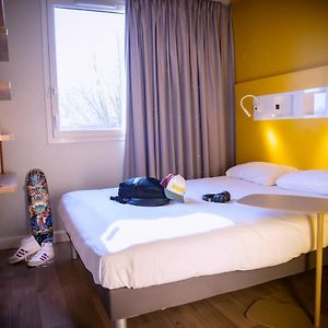 Kamer met Twee Kamers en een King Size Bed